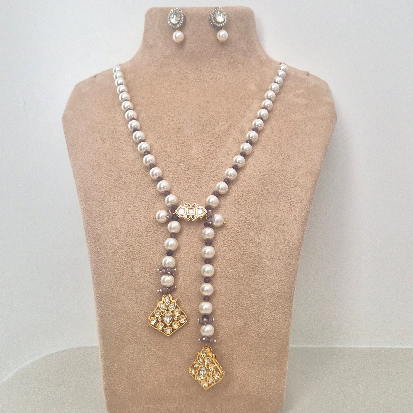 Pearl strings with kundan drops