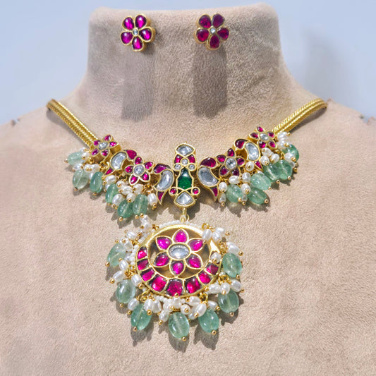 Kundan and pink quartz with jade and seed pearls, in a vintage chokur necklace
