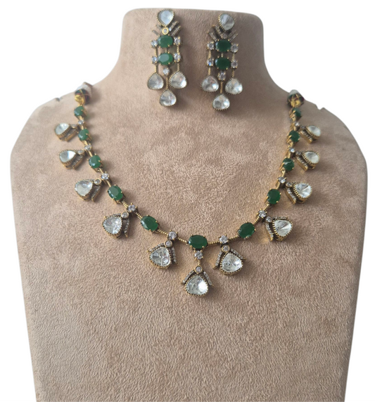 Green quartz and lustrous moissanites make this antique finish necklace set