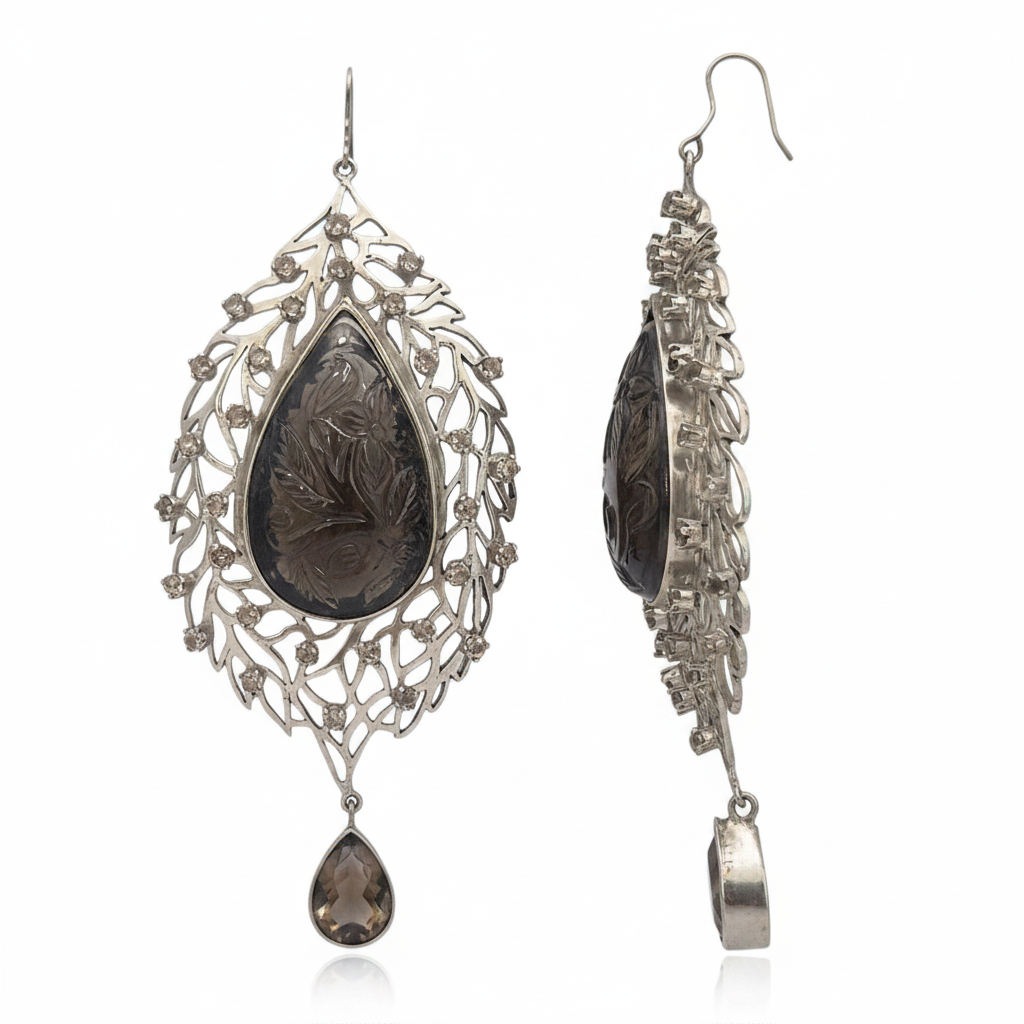 Natural Smoky Topaz carved and set amongst scattered filigree work , design inspired from the season of Autumn, set in 925 Silver