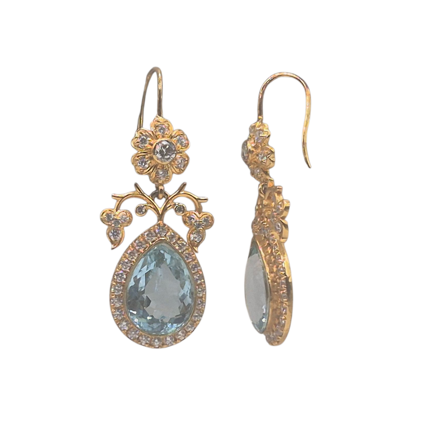 Natural Blue Topaz Gemstones in a floral themed design in 925 Silver, with Gold Plating