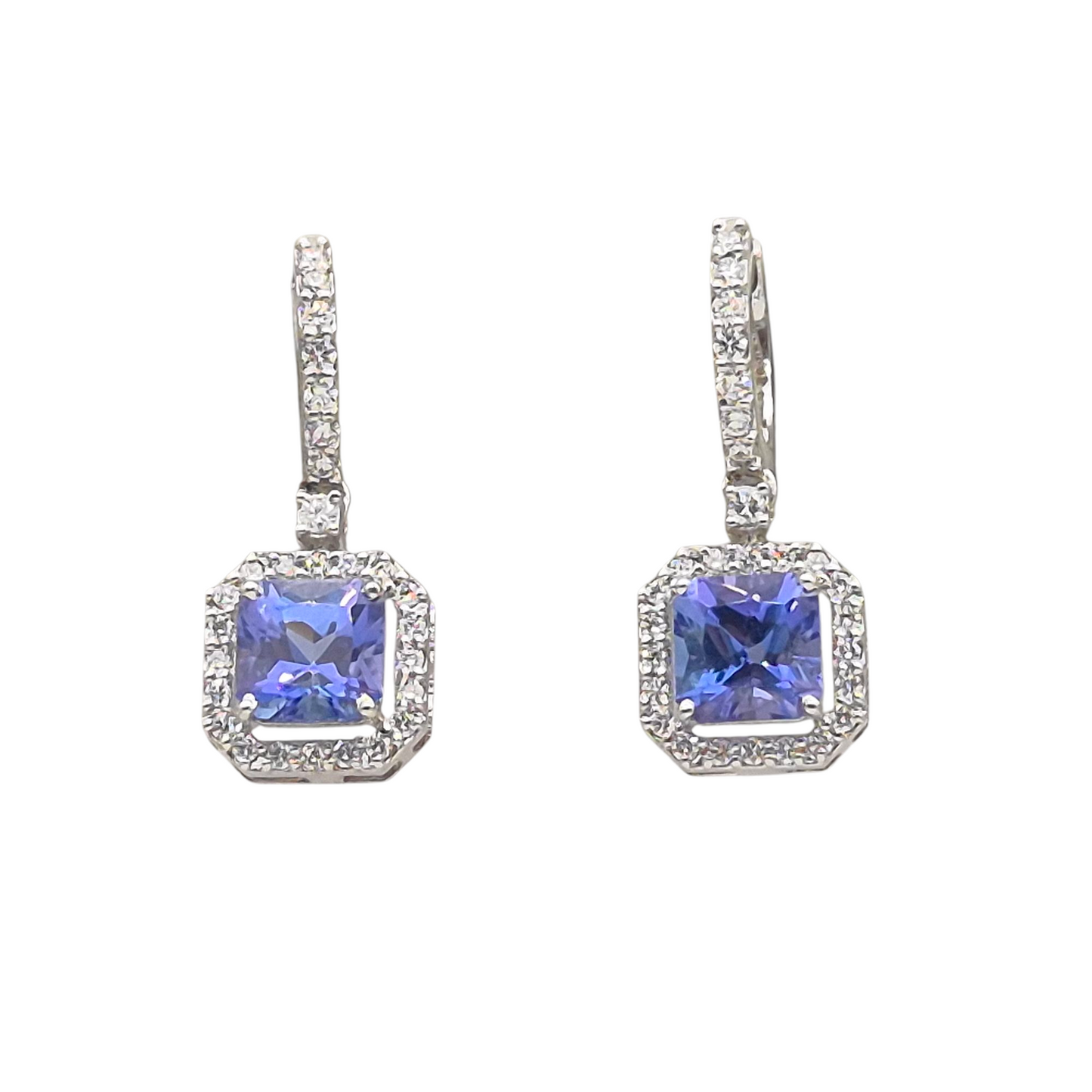 Princess cut Natural Tanzanite gemstones set with natural diamonds in 9kt white gold