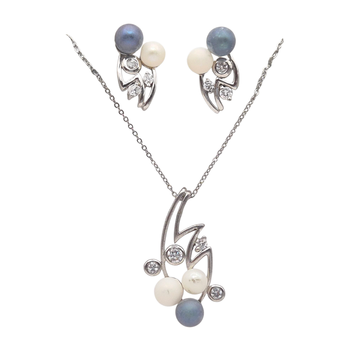 Natural white and tahitian Pearls set in cubic zirconia in 925 silver
