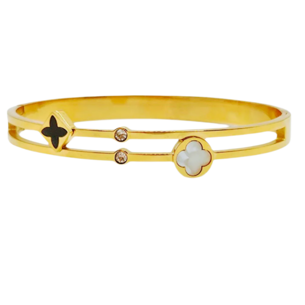Bangle styled bracelet with mother of pearl and crystals in yellow plating