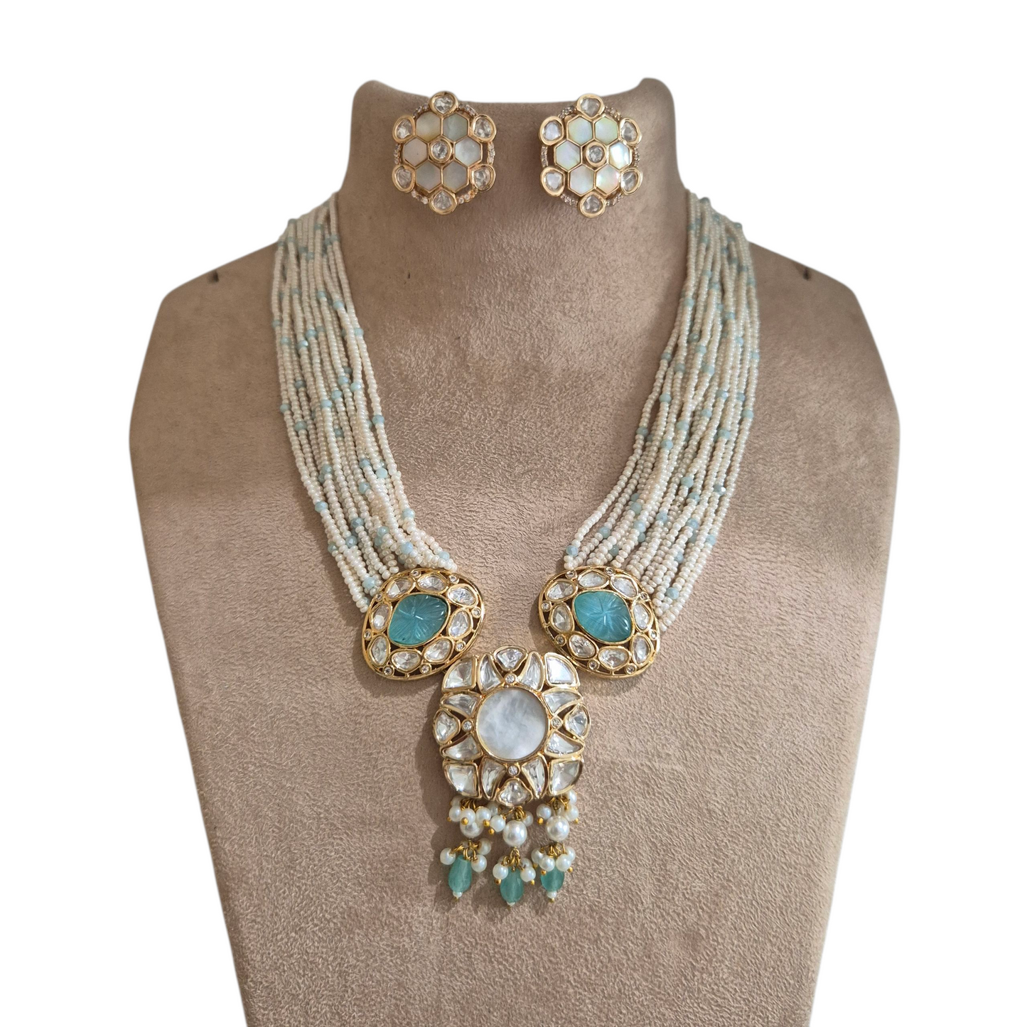 Mother of pearl, seed pearls and sea green quartz in brass