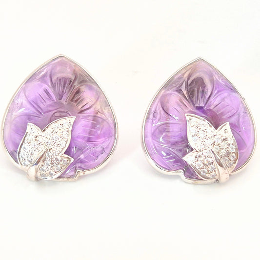 Natural Carved Amethyst Gemstones and Cubic Zircionia set to make this floral design in 925 Silver