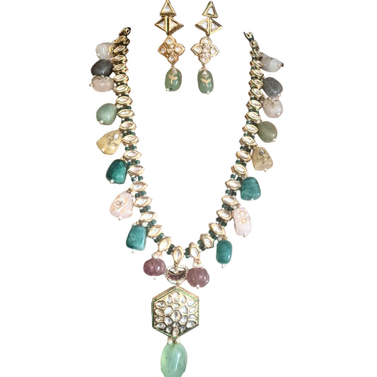 Agate , carved and with kundan engraved makes this multigemstone necklace set in brass