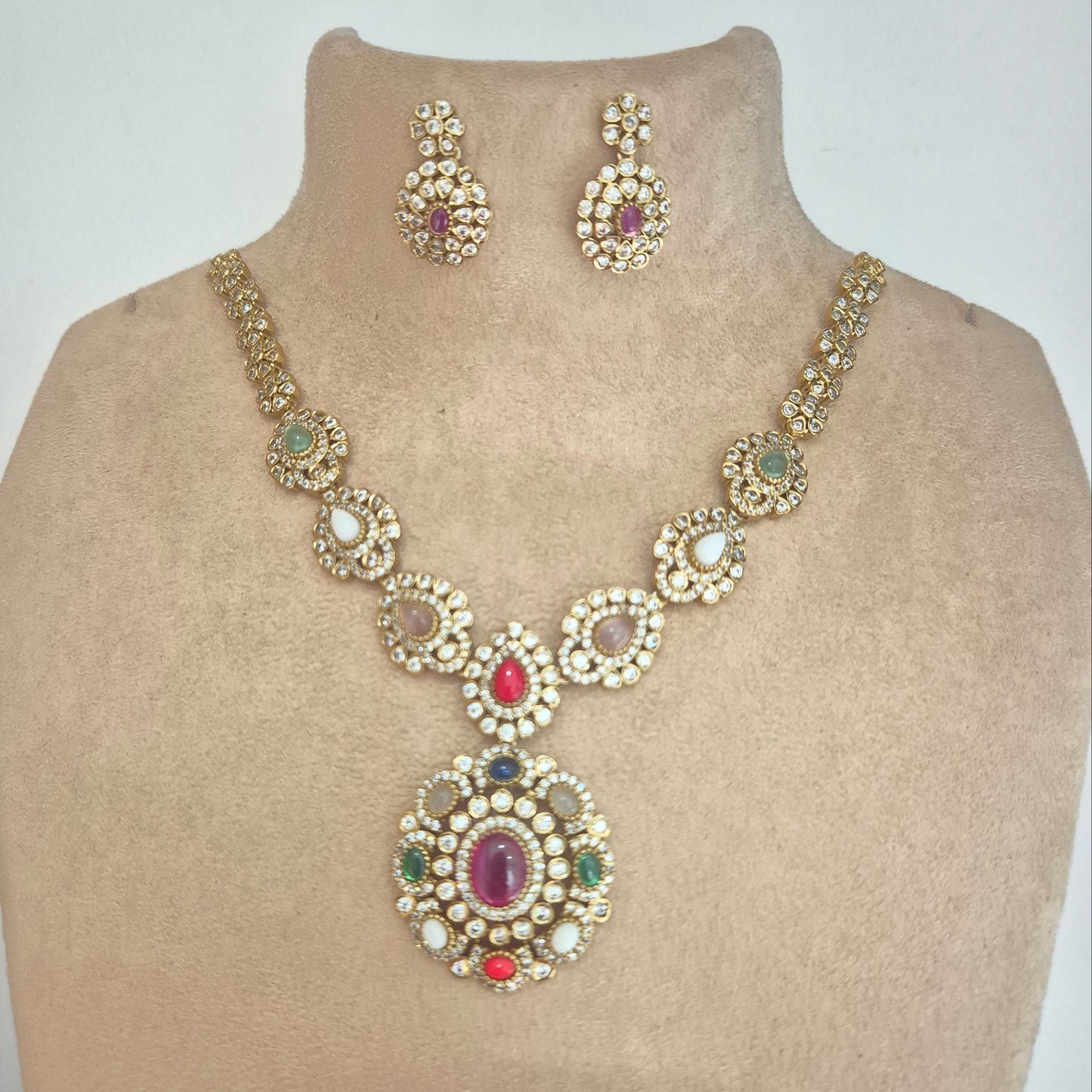 Navratna with semi precious gems and kundan in brass