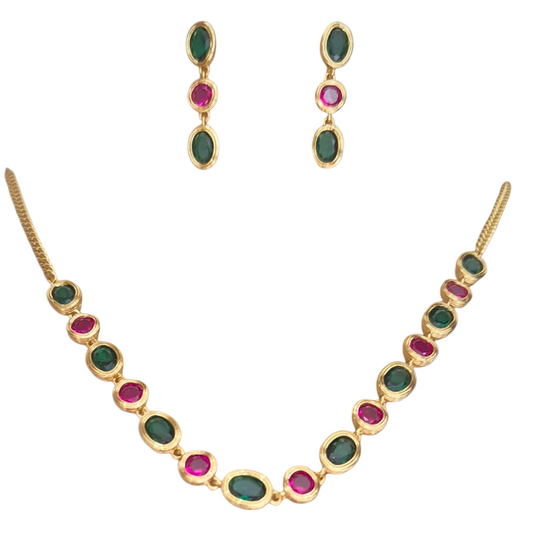 Green and maroon quartz in brass