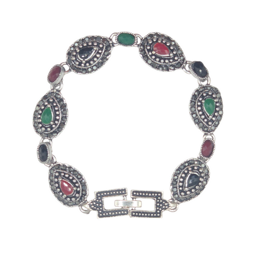 Multicolour quartz in pear and oval in brass with marcasite