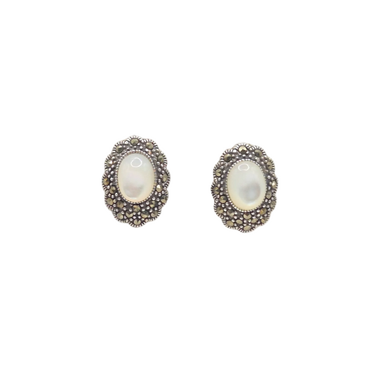 Mother of pearl with marcasite floral setting in 925 silver