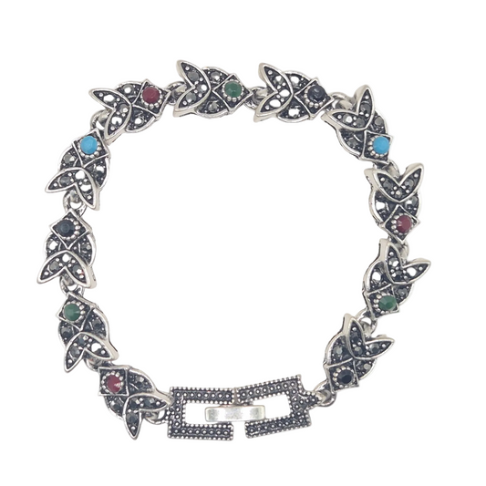 Multicolour quartz with Marcasite in brass