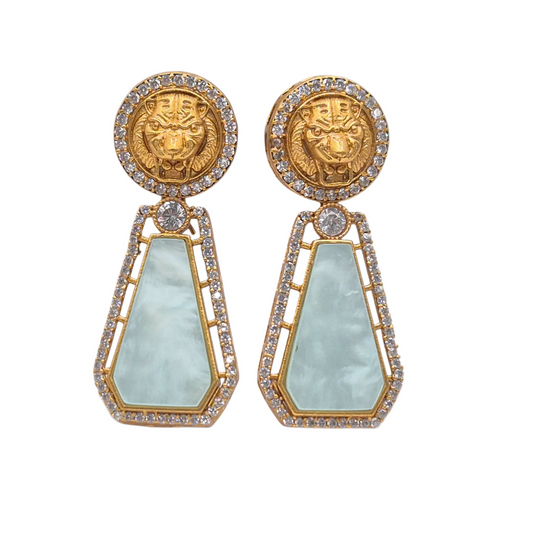 Mother of pearl with a designer stud in zircons, in brass