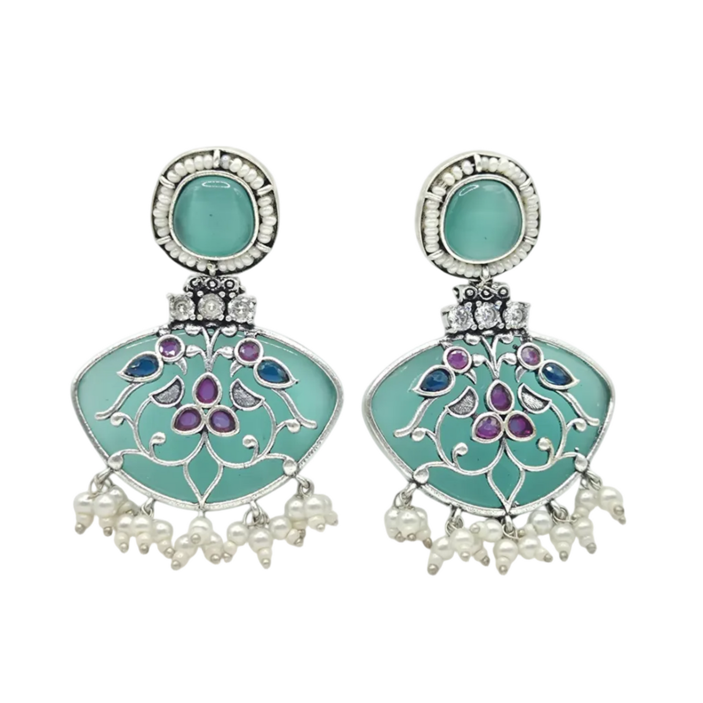 Pastel green quartz with a peacock motif in brass