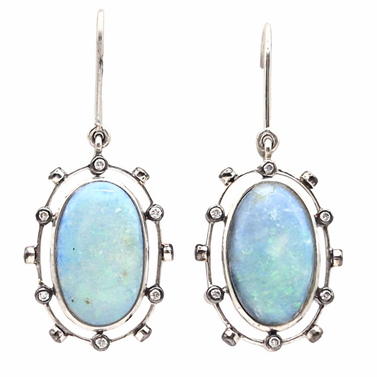 Natural Australian Opal displaying a play of colours with Zircons in 925 Silver, black plating