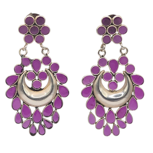 Vibrant Pink Rubies set in 925 Silver, in a traditional semi formal style
