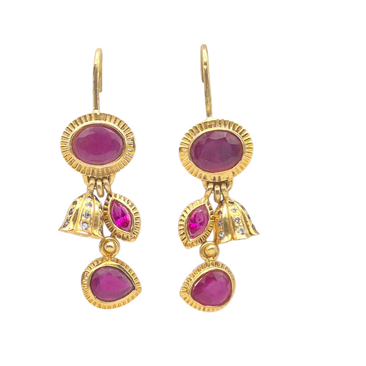 Natural gorgeous Red Rubies set in an art deco design in 925 Silver, with gold plating