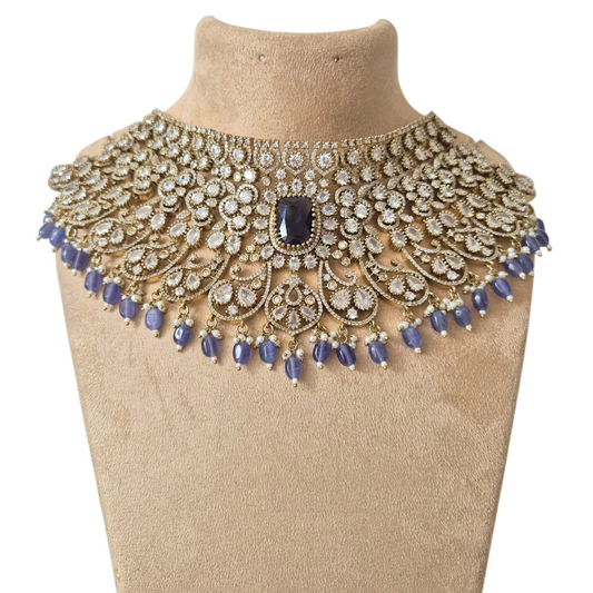 Purple Hydro stones with lustrous Moissanites and seed pearls, makes this antique chokur