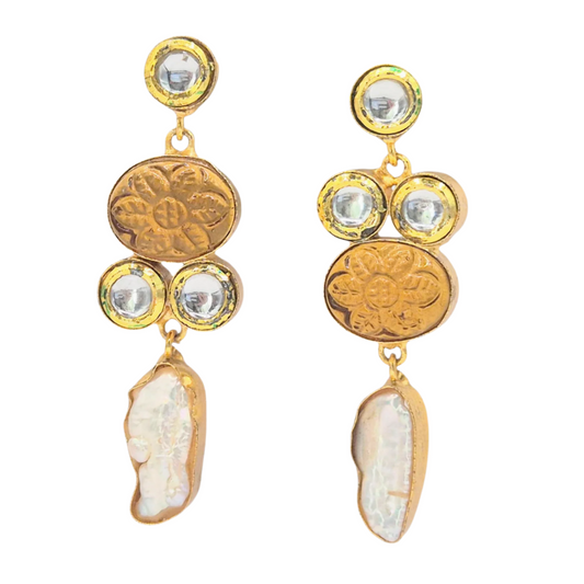 Carved Hydro Quartz and Baroque Pearls paired with Kundan make these danglers in brass, with plating