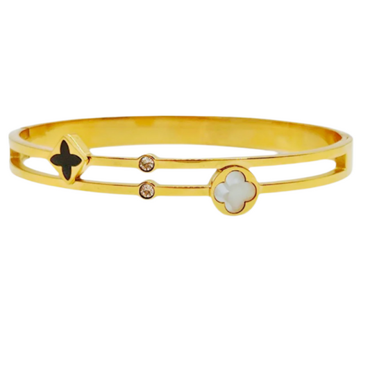 Bangle styled bracelet with mother of pearl and crystals in yellow plating