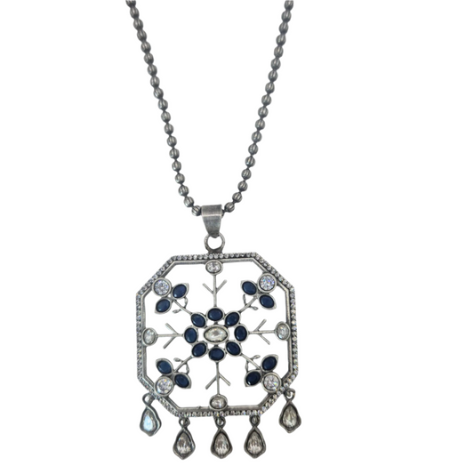 White slab of quartz worked upon with kundan in german silver