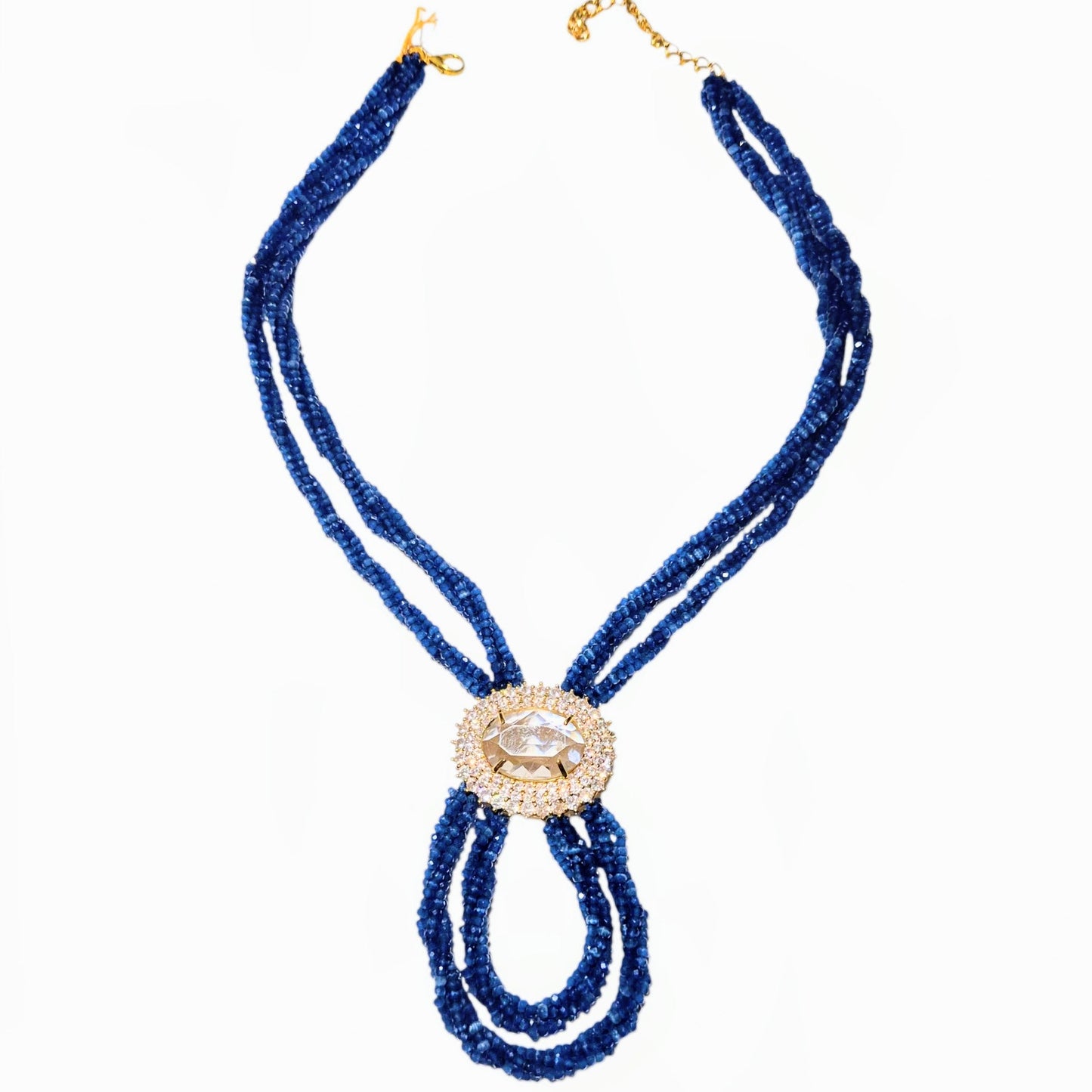 Blue czech beads entwined to make this necklace with a crsytal pendant