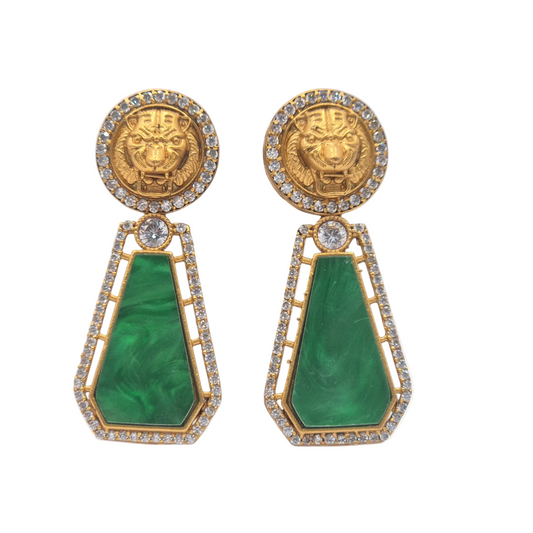 Mother of pearl with a designer motif with zircons in brass