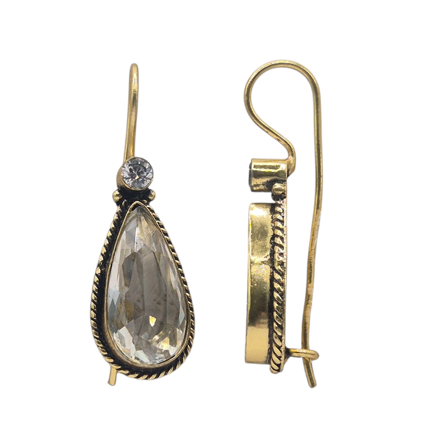 White quartz with a tinge of golden , in brass