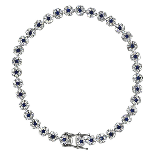 Silver bracelet with blue stones on a white background