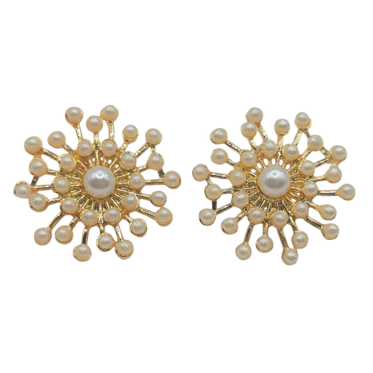 Pearls in a vibrant design set in brass