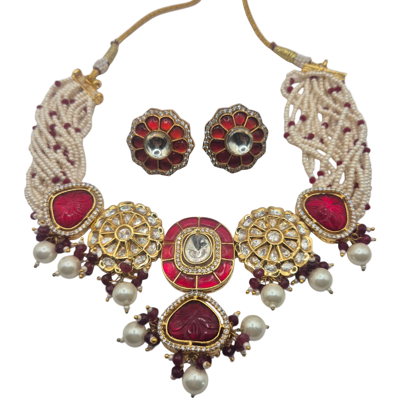 Bright red quartz with kundan and seed pearls in Brass
