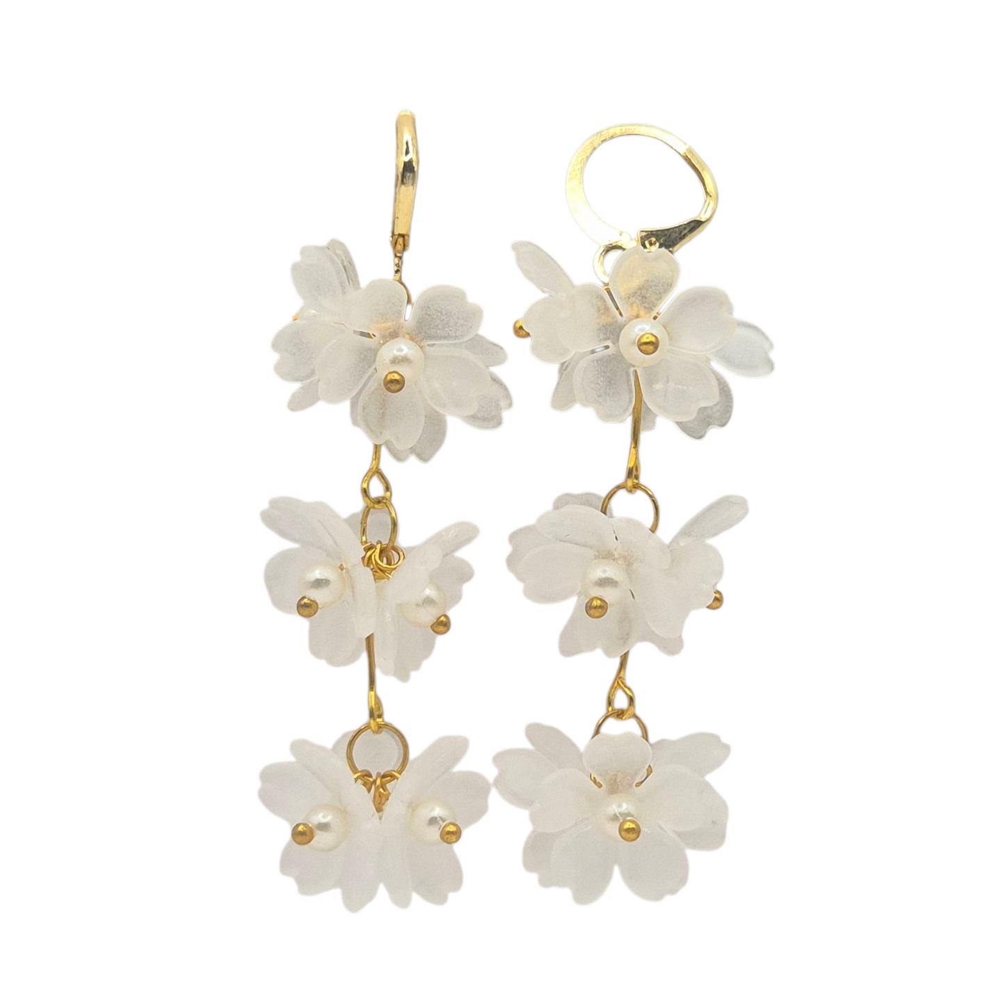 White flowers hanging in bunches, made in brass