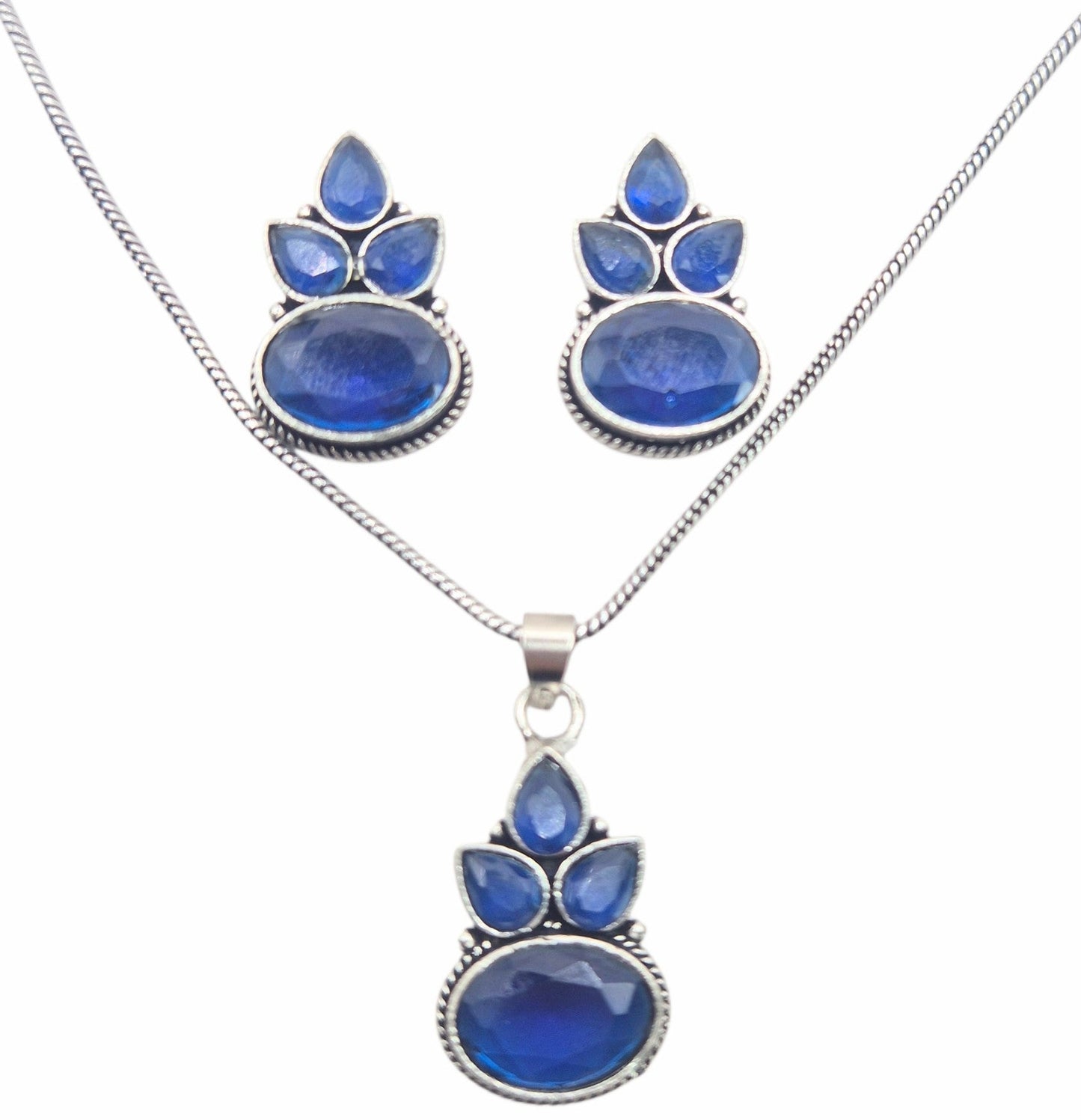 Dark Blue Oval quartz and pearl set in brass