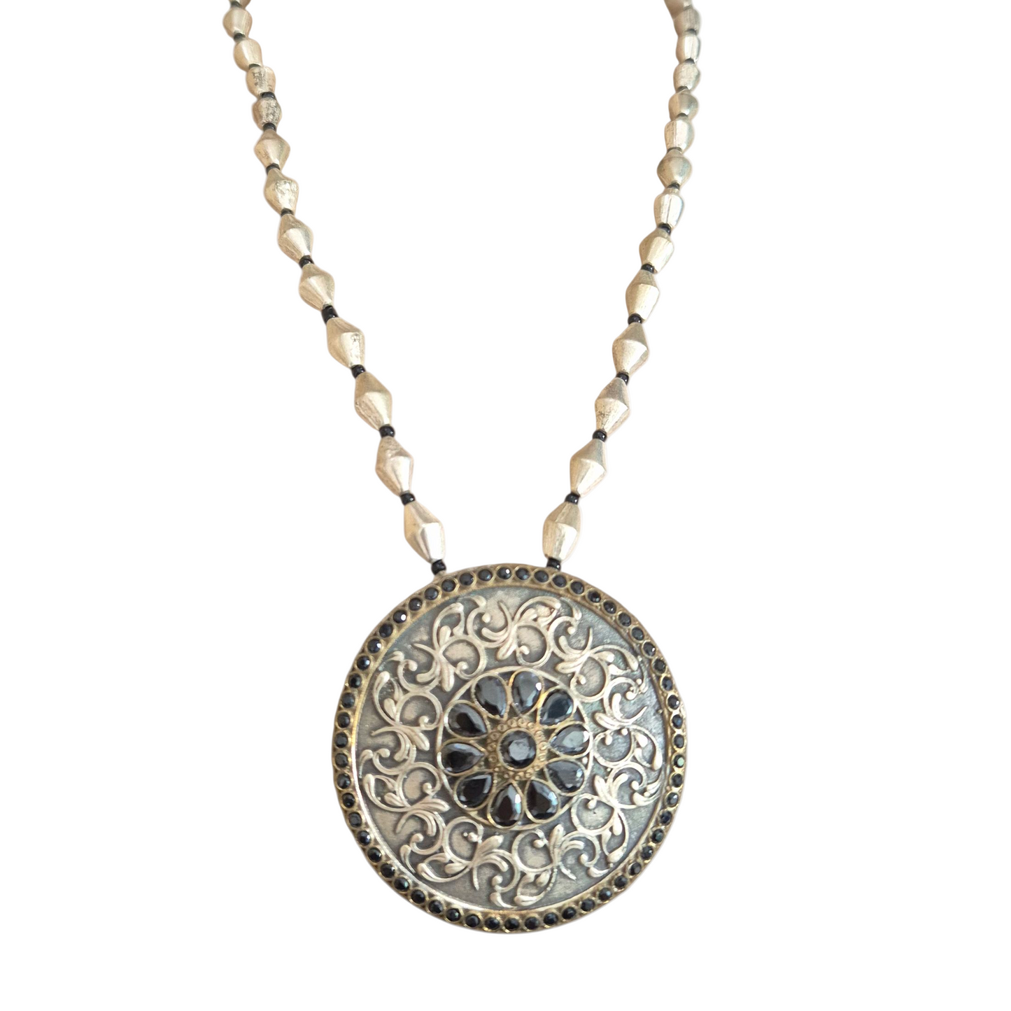 Vintage pendant with black quartz in brass