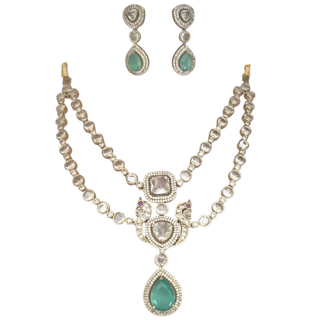 Moissanite and cubic zirconia with mint green quartz in brass