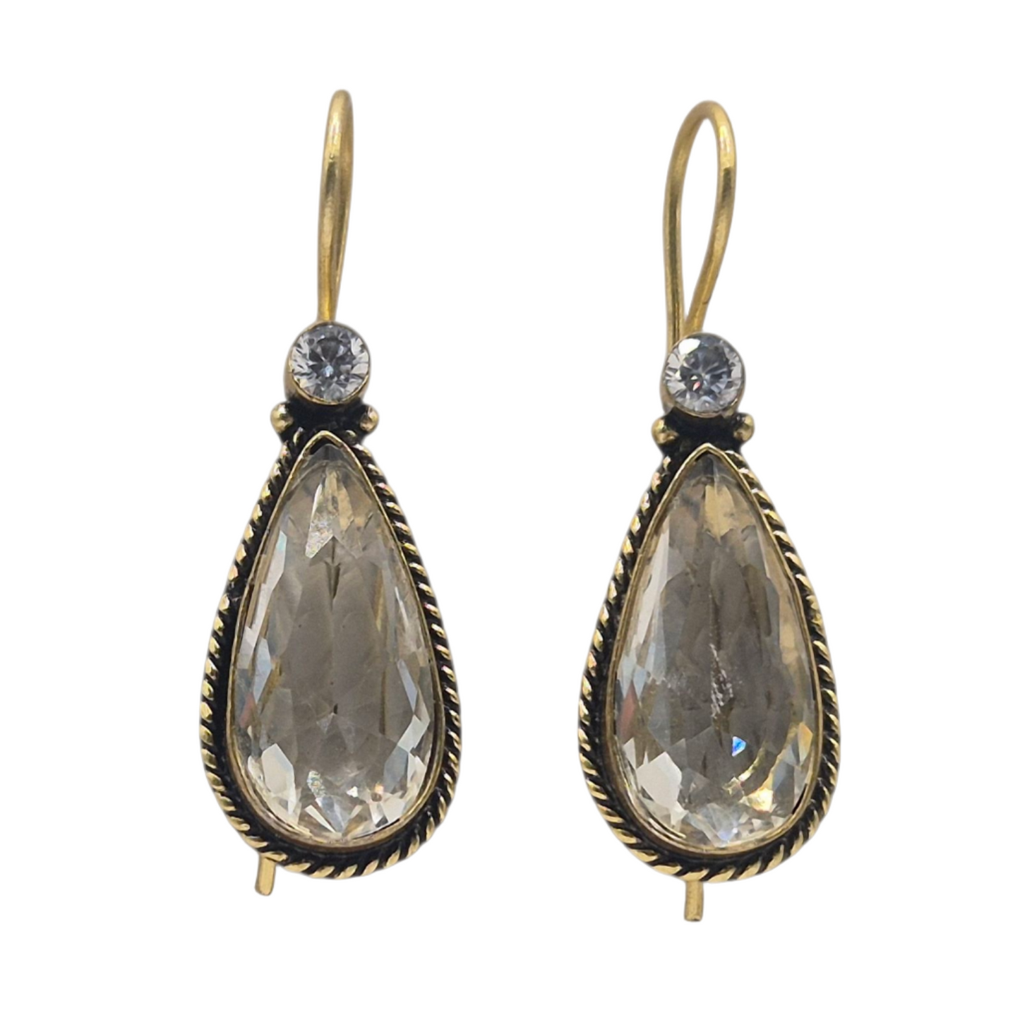 White quartz with a tinge of golden , in brass