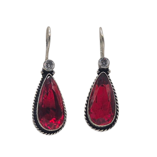 Vibrant red quartz teardrop in brass