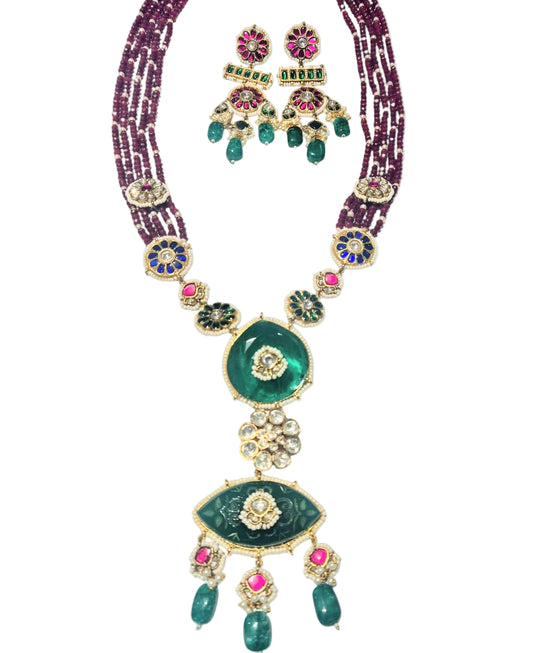 Carved green onyx with kundan and maroon quartz beads in brass