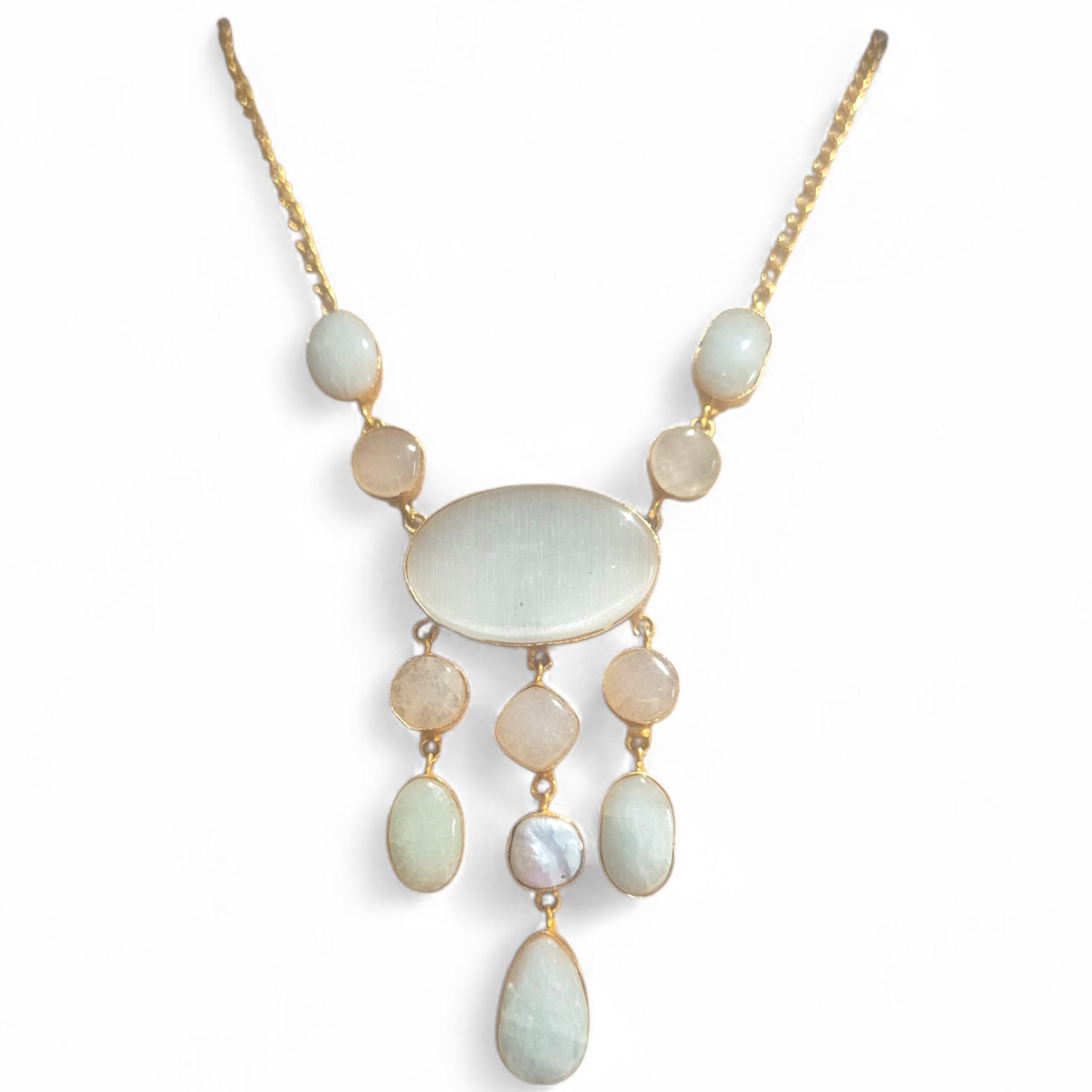 White quartz and pearl in brass