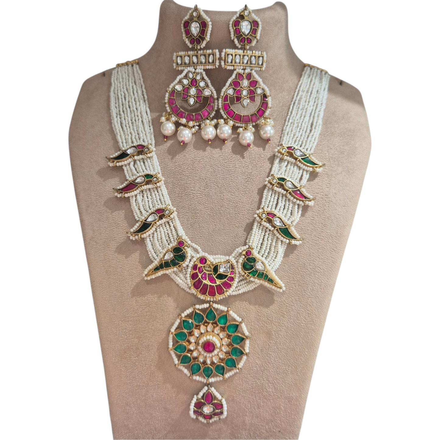 Kundan and seed pearls in a nature inspired design made in brass
