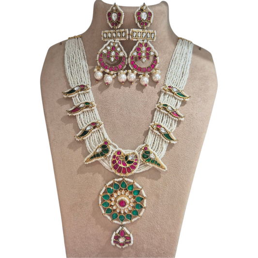 Kundan and seed pearls in a nature inspired design made in brass