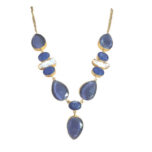 Dark blue and purple quartz in brass